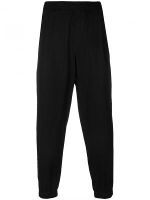 Спортивные брюки с эластичными манжетами McQ Alexander McQueen. Цвет: чёрный