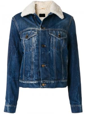 Джинсовая куртка с отделкой из овечьего меха Saint Laurent. Цвет: синий