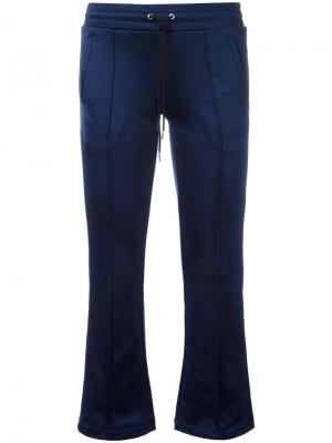 Расклешенные спортивные брюки Mm6 Maison Margiela. Цвет: синий
