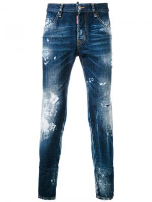 Зауженные джинсы с эффектом разбрызганной краски Dsquared2. Цвет: синий