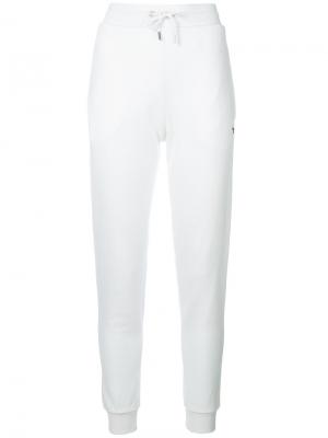 Спортивные брюки с вышивкой логотипа Maison Kitsuné. Цвет: белый