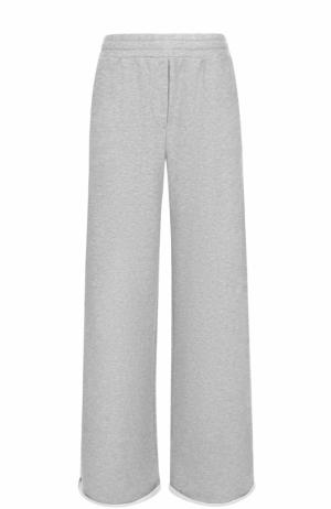 Расклешенный хлопковые брюки T by Alexander Wang. Цвет: серый