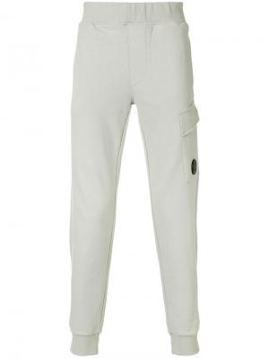 Зауженные спортивные брюки CP Company. Цвет: серый