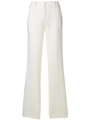 Расклешенные брюки с полосатыми панелями Dolce & Gabbana. Цвет: телесный