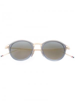 Солнцезащитные очки в круглой оправе Thom Browne Eyewear. Цвет: металлический
