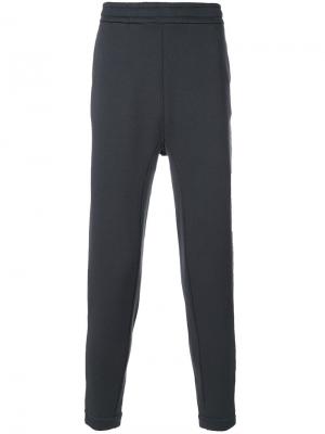 Спортивные брюки Jil Sander. Цвет: серый